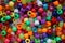 Closeup shot of multi-colored plastic beads for handicraft