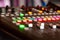 Closeup shot of a music keyboard equalizer colorful buttons