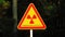 Closeup shot of a nuclear warning sign with the text in Russian