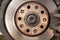 Closeup shot of a old rusty brake disc and caliper on car