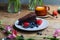 Closeup shot of a piece of brownie cake with blueberries and strawberries