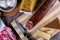 Closeup shot of a piece of parmesan cheese Ventricina sausage and bread on a cutting board