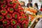 Closeup shot of a pile of beautiful red and orange sweet peppers in the market