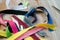 Closeup shot of a pile of colorful zips on a wooden surface