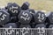 Closeup shot of a pile of fifteen-pound dumbbells