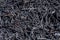 Closeup shot of a pile of shredded recycled rubber waste