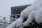 Closeup shot of a pile of snow on  a blurred background