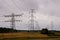 Closeup shot of power towers on a cloudy day