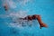 Closeup shot of a professional swimmer practicing in the swimming pool