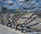 Closeup shot of a safety catch fence with a lot of wires and cables