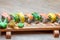 Closeup shot of a selection of vegetable rolls on a wooden platter.