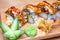 Closeup shot of a selection of vegetable rolls on a wooden platter.