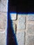 Closeup shot of shadows covering a surface made of rectangular stones