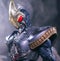 Closeup shot of SIC Kamen Rider Blade Ace Form figure on dark background filled with smoke