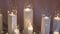 Closeup Shot Of A Single White Candle Burning With Soft Candle Light. Candle Wax Melting Slowly