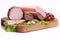 Closeup shot of slices of sausages with green lettuce on a wooden board