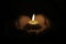 Closeup shot of a small candle in person\\\'s hands- perfect for praying, pray, prayer concepts
