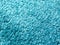 Closeup shot of soft fluffy bright blue carpet texture details