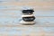 Closeup shot of a stack of flat stones on a wooden table