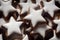 Closeup shot of star-shaped German cinnamon cookies called Zimtsterne