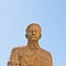 Closeup shot of the statue of Iosif Stalin under the clear sky