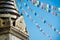 Closeup shot of the Swayambhu ancient religious complex atop a hill in the Kathmandu Valley