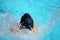 Closeup shot of a swimmer practicing in the swimming pool