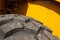 Closeup shot of a tire of heavy machinery or wheel loader