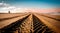 Closeup shot of tire prints in a sandy shore under a sunset sky background