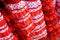 Closeup shot of traditional dotted red, white, and black flamenco dresses