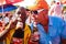 Closeup shot of two African American males posing while drinking Castle beer