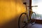 Closeup shot of an unbranded hipster single-speed bicycle parked in the room
