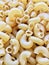 Closeup shot of uncooked elbow macaroni pasta