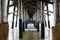 Closeup shot under pier with calm blue sea