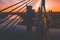 Closeup shot of Vansu bridge cables on background of a sunset on Riga, Latvia