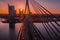 Closeup shot of Vansu bridge cables on background of a sunset on Riga, Latvia