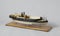 Closeup shot of a vintage figurine of a ship isolated on a white background