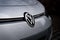 Closeup shot of the Volkswagen car logo on the front of the vehicle.