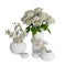 Closeup shot of white elegant vases with roses and orchids on an isolated background