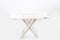 Closeup shot of a white picnic table isolated on a white background