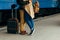 Closeup shot of woman feet standing on tiptoe while embracing her man at railway platform for a farewell before train