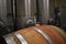 Closeup shot of the wooden barrels in the winemaking factory