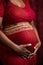 closeup show of pregnant woman, future mother hand on belly, pregnancy concept