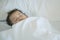 Closeup sick child sleep on hospital bed textured background