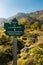 Closeup of a sign post pointing towards Punta Lattiniccia and Monte Cardu Cardo located in the Regional Natural Park of Corsica