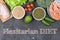 Closeup of a signboard with the text flexitarian on a pile of some different raw vegetables, such as cauliflower of