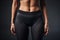 Closeup Of Slender Athletic Womans Belly Girl In Sports Leggings. Generative AI