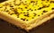 Closeup of slice of passion fruit cheesecake