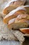 Closeup sliced Baguette on the sackcloth