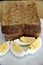 Closeup of slices of toasted whole wheat bread with boiled eggs on a plate for breakfast